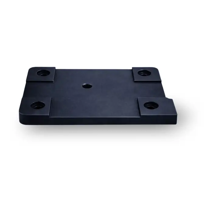 Black anodized rectangular mounting plate with counterbored holes fabricated via precision milled aluminum components techniques.