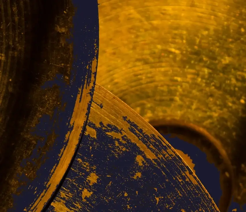 A detailed industrial shot of raw copper stock plates representing our heavy material sourcing capabilities.