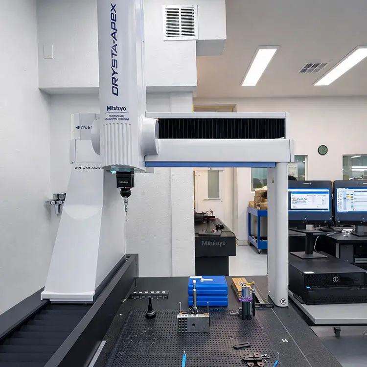 ur Mitutoyo Crysta-Apex CNC CMM coordinate measuring machine inside the quality assurance inspection lab.